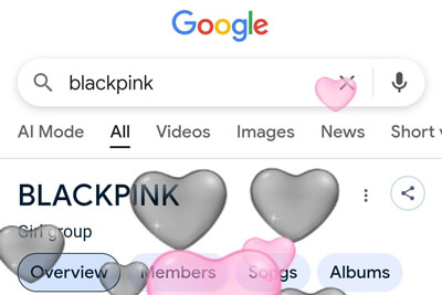 帶有愛心按鈕和粉色霧氣的 Google BLACKPINK 搜尋結果頁